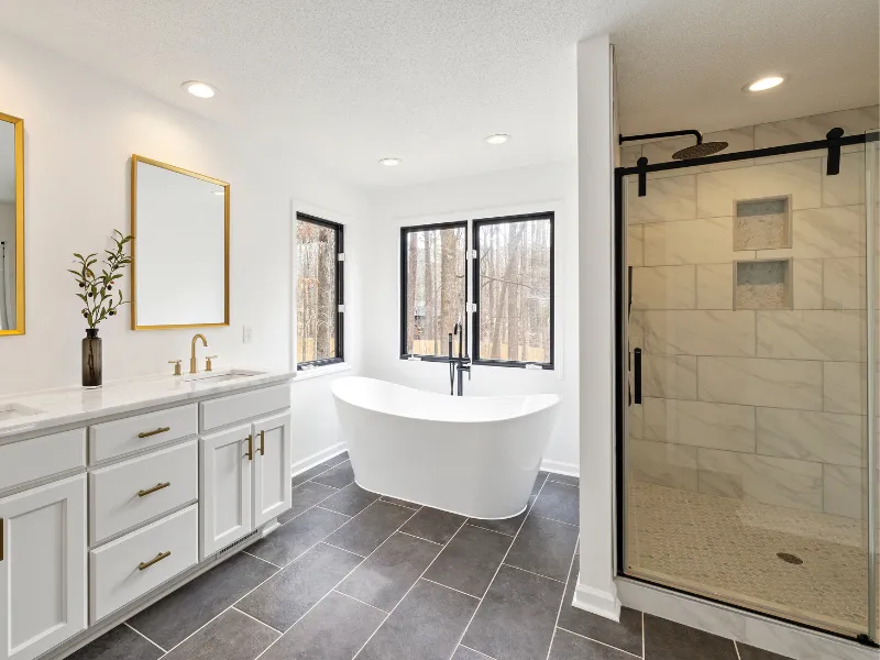 Full bathroom renovation in Cornelius, NC, with custom tile shower, new vanity, and updated fixtures